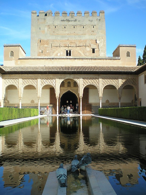 The Arrayanes Courtyard in Comares Palace, in Alhambra, Granada, Spain
