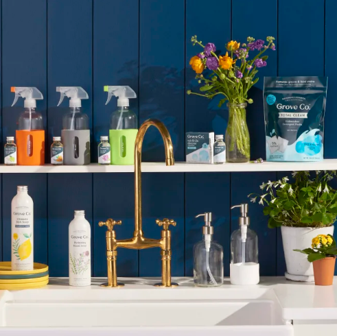 Grove cleaning products in a blue kitchen