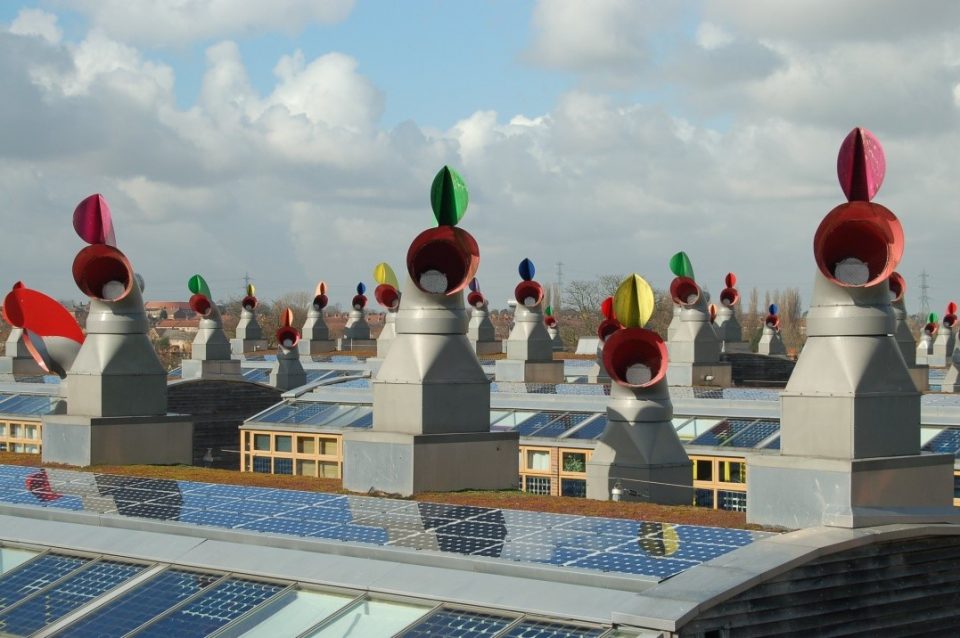 Passive ventilation system wind cowls add some color to the skyline