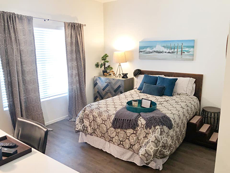 After photo of the furnished master bedroom. Photo credit: Humble Design San Diego