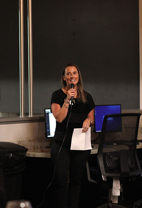 DI graduate Chelsea Metheny, class of 2018, speaks in front of fellow alumni and staff members, encouraging others to join the first Alumni Network Committee