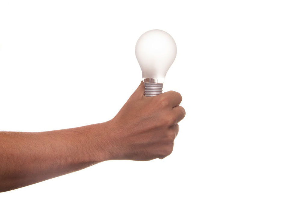 holiding light bulb