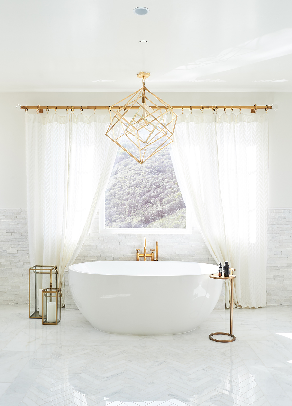 Photo of a newly installed bathtub in front of a window by Jaki Yermian of JY Design Interiors