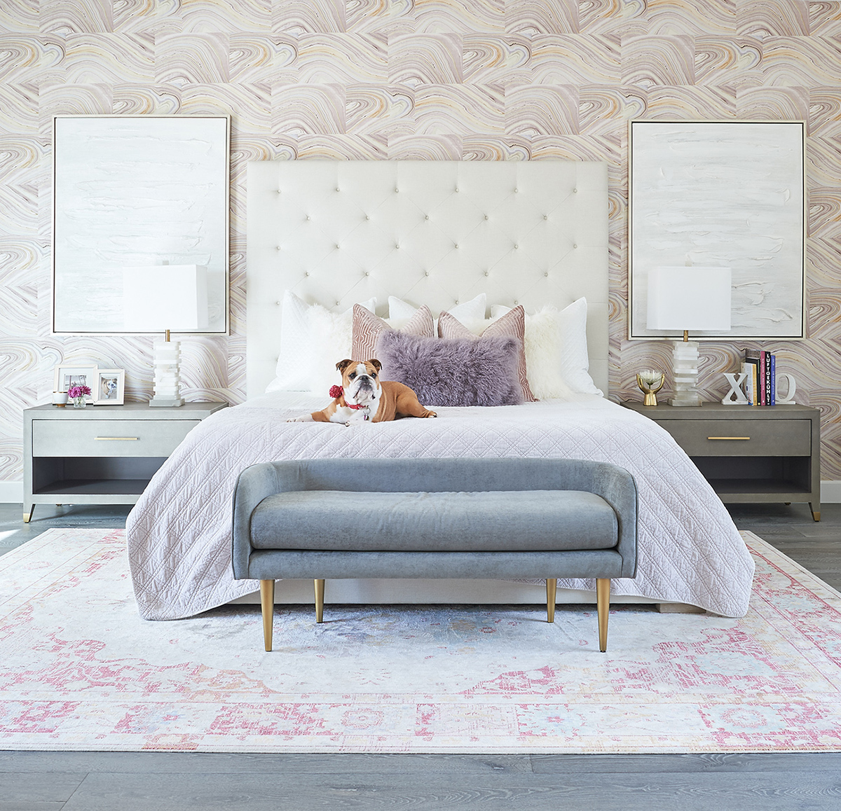 Photo of bedroom remodel done by Jaki Yermian of JY Design Interiors. There is an english bulldog posed on the bed