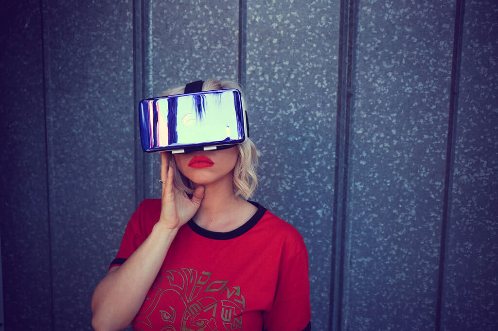 Interior Design Trends 2020 - 3D/VR Interior Design. Blonde woman with red shirt wearing a VR headset