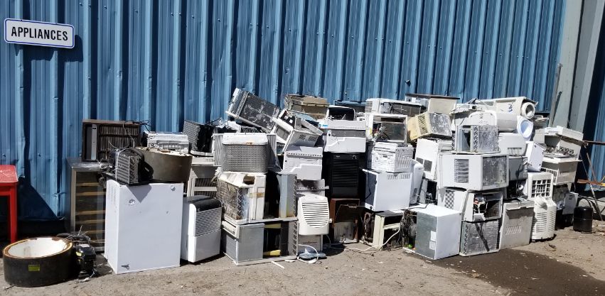 Appliances awaiting recycling. Appliances are difficult to recycle.